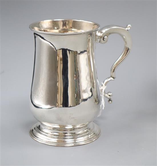 A George III silver baluster mug, Joseph Steward, London, 1767, (repaired), 9 oz.